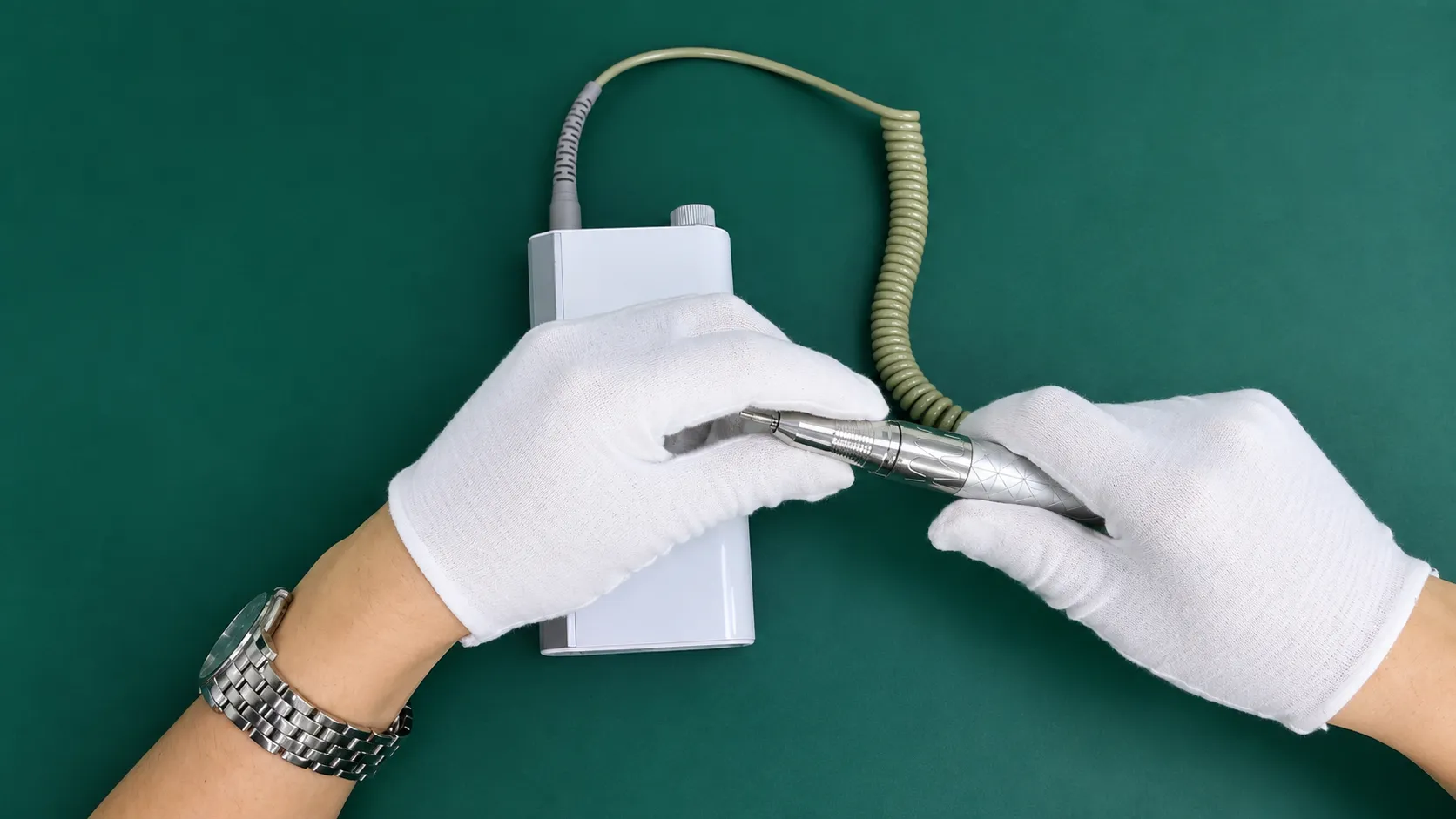 Disassembling the electric grinder handpiece housing to access 1650NR-01A-24.0 BLDC motor